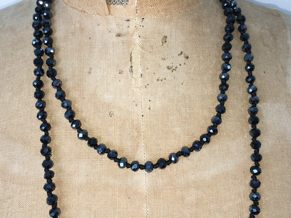 Close up of Lil Jewellry, faceted crystal necklace in jet black