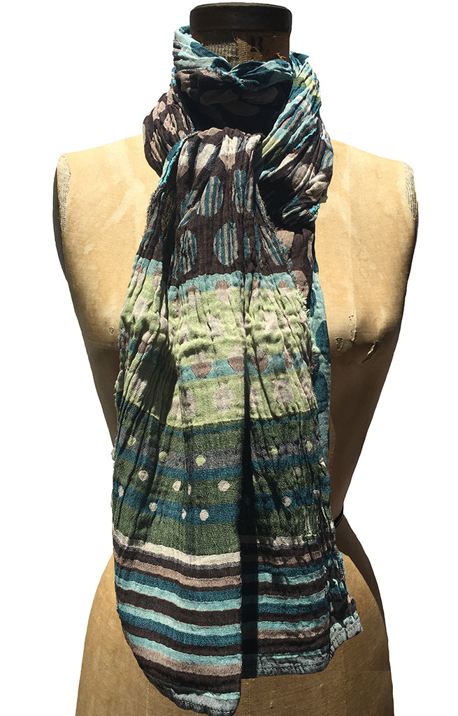 The Letol Colleen scarf has dot and stripe motifs in browns, turquoise and celery green.