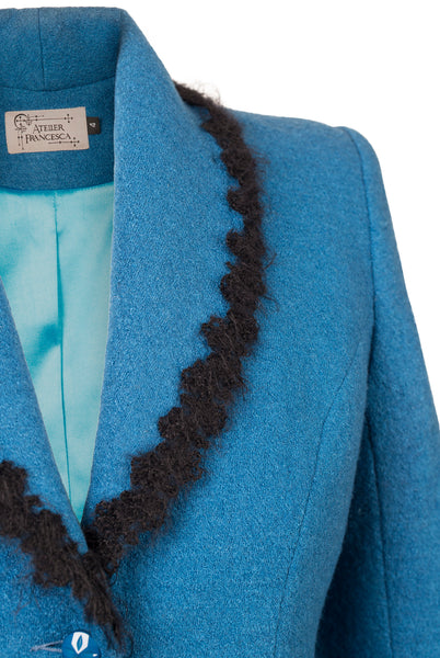 Detail of Atelier Francesca Teal Blue Jacket with Black Angora Trim.