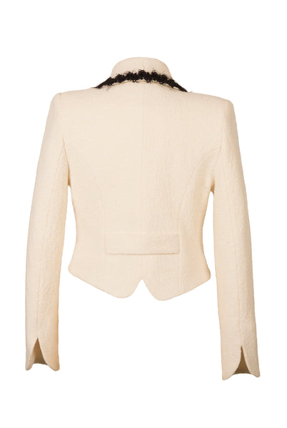 Back view of Atelier Francesca White Jacket shows hem and sleeve detail.