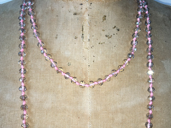 Close up of Lil Jewellry, faceted crystal necklace in pink & clear crystal