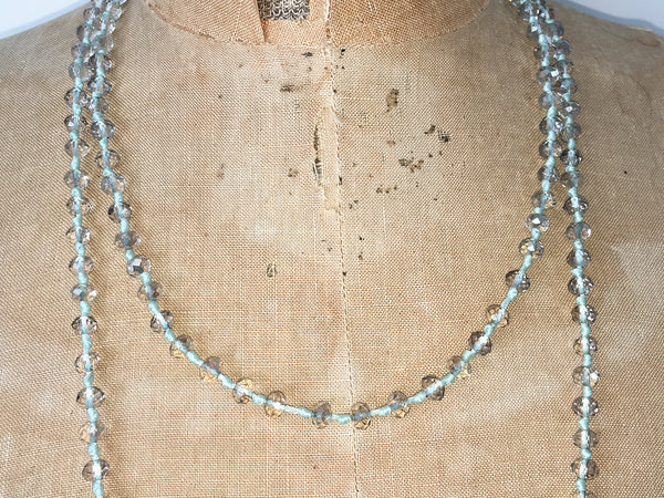 Close up of Lil Jewellry, faceted crystal necklace in turquoise & clear crystal