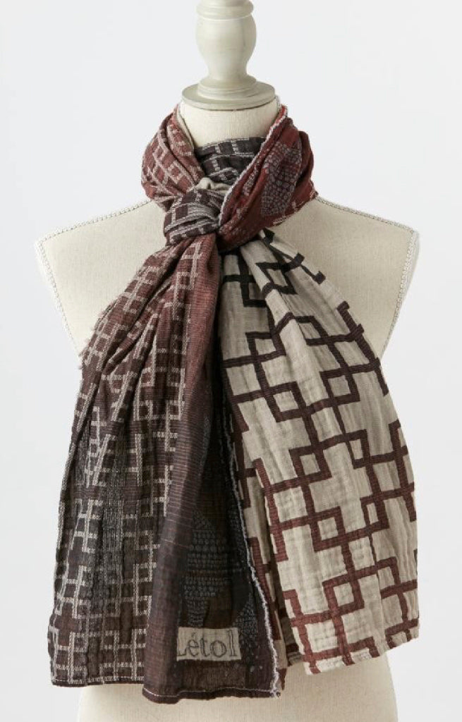 Letol scarf in sophisticated, strong geo pattern in black, rust, wine, warm grey.