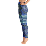 Side view of abstract mandala print leggings in blue and green. Print on demand.